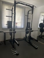 PB Extreme Half Rack - black/PB Strong competition barbell bar/weight plates