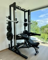 High-Quality Technogym Olympic Half Rack Pure Complete Set incl. Bench, Barbell and 137.5 kg Weights